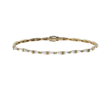 Tapered baguette lab-grown diamond tennis bracelet, 1.92ct in 18K recycled yellow gold.
